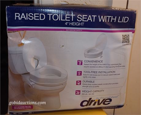 Raised toilet seat